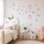 motyle-na-sciane-rozowo-mietowe.webp